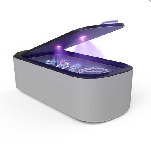 Ultrasonic cleaner with UVC light